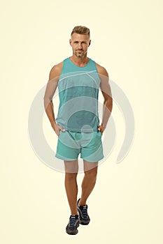 Athletic body. Guy sport outfit. Fashion concept. Man model clothes shop. Sport style. Menswear and fashionable clothing