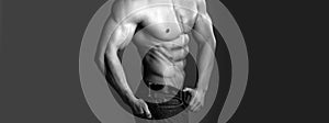 Athletic bodybuilder man on grey background. Banner templates with muscular man, muscular torso, six pack abs muscle.