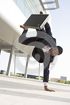 Athletic businessman outside office