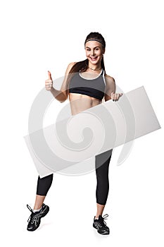 Athletic fitness woman with sign board blank helthy sport isolated white background black clothes