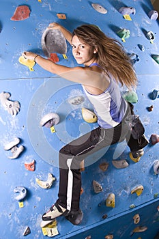 Athletic girl climbing