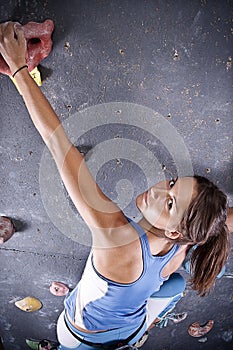 Athletic girl climbing