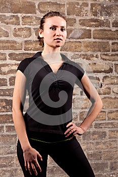 Athletic girl posing black shirt