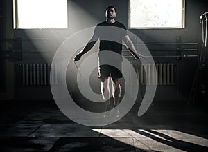 Athletic Male Jump With Skipping Rope .