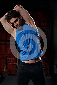 athletic man in blue tank top