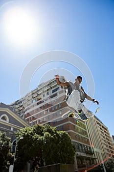 Athletic man doing parkour in the city