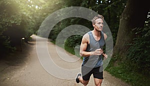 Athletic Man Doing Running Exercise at the Park