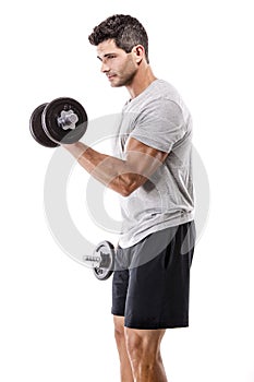 Athletic man lifting weights