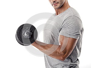 Athletic man lifting weights