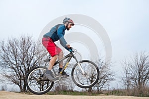 Athletic man riding a bike. lifestyle