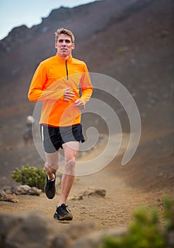 Athletic man running jogging outside, training