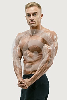 Athletic man with strong abs and core muscles