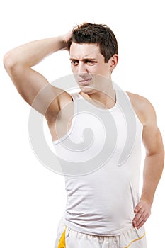 Athletic man with thinking expression white isola