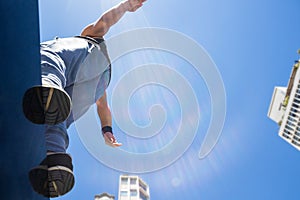 Athletic man about to do a back flip