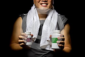 Athletic Man Using Supplements