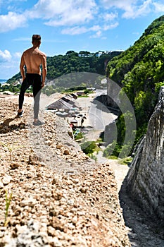 Athletic Muscular Hiker Man On Hill In Summer. Outdoor Sport