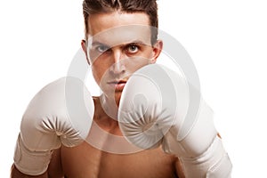 Athletic muscular sportsman at studio isolated