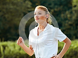 Athletic Runner Training in a park for Marathon.