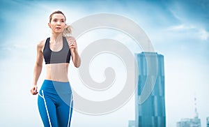 Athletic sport woman running and jogging