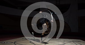 Athletic training session, young circus performer is spinning in a wheel, 4k