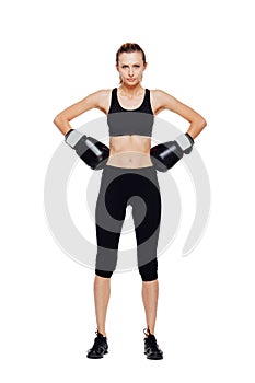 Athletic woman boxing, isolated on white