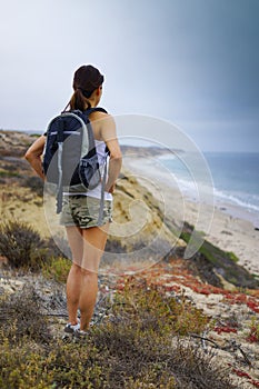 Athletic Woman Hiking Ocean Scenery