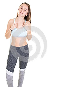 Athletic woman isolated over white background Personal fitness instructor training