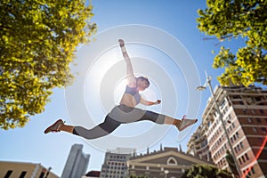 Athletic woman leaping