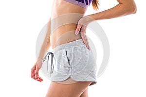 Athletic woman showing her buttocks