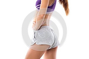 Athletic woman showing her buttocks