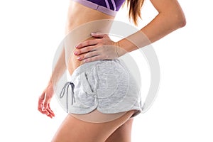 Athletic woman showing her buttocks