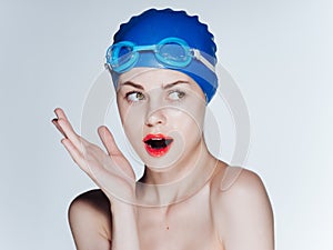 athletic woman in swimming goggles workout Studio