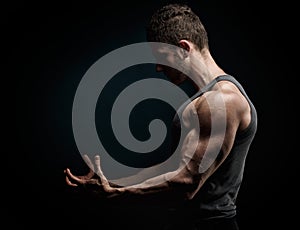 Athletic young man portrait in studio