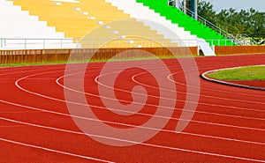 Athletics stadium with red track : sport theme