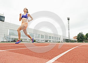Athletics woman Track Athlete Running On Track