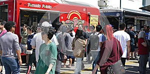 eating fast food at the 50th Annual University District Street Fair