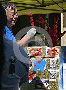 ating fast food at the 50th Annual University District Street Fair