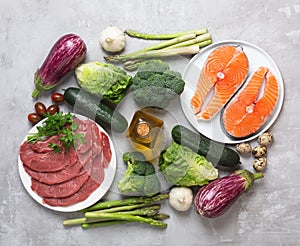 Atkins Diet food ingredients on concrete background, health concept, top view, flat lay