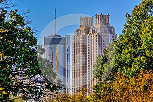 Atlanta cityscape buildings in between green trees