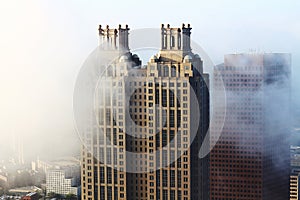 Atlanta& x27;s south end buildings in fog