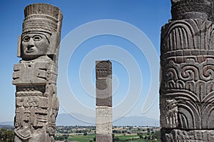 Atlantean figure and ancient columns at the archaeological sight in Tula