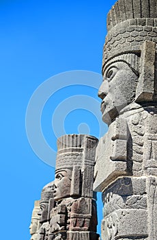 Atlantean figures against blue sky at the archaeological sight in Tula
