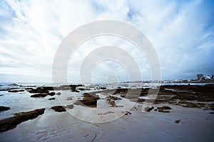 Atlantic coast at low tide near Cascais. tinted