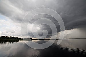 Dark Storm Clouds over Waterway photo