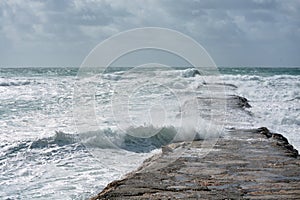 Atlantic ocean beach. Waves in Portugal coast. Season specific. photo