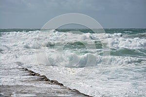 Atlantic ocean beach. Waves in Portugal coast. Season specific. photo