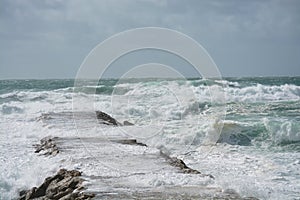 Atlantic ocean beach. Waves in Portugal coast. Season specific. photo