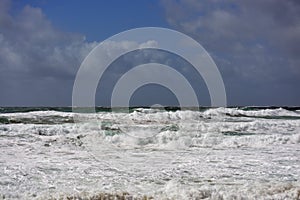 Atlantic ocean beach. Waves in Portugal coast. Season specific. photo