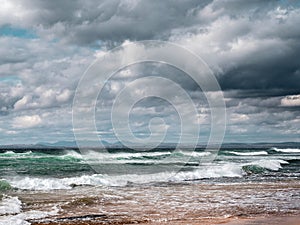 Atlantic ocean, dramatic sky, Waves rushing towards the coast. Fanore beach, county Clare, Ireland