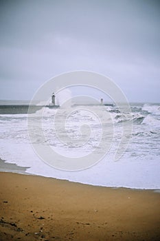 Atlantic Ocean splash time. Lighthouse.